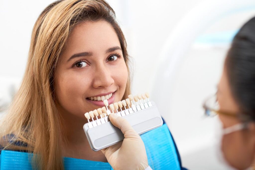Dentist uses coloring matching tool to create veneers for patient