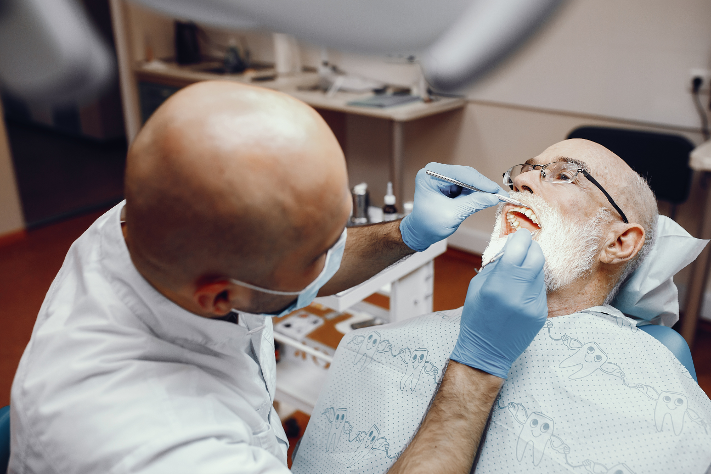 Dentist examining a dental crown on a patient at Art of Modern Dentistry Chicago